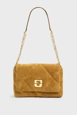 Crossbody bag in quilted suede leather